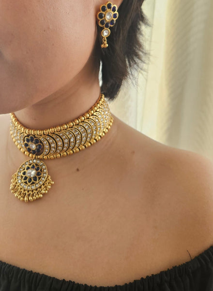 Gold necklace and earrings