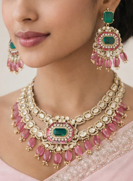 Close-up of a woman wearing a pink and green jewelry set