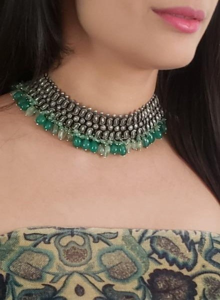 silvertone choker with green drops