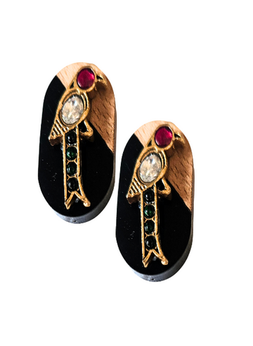 A pair of dual color wooden stud earrings with red and green accents, and a bird-shaped design.