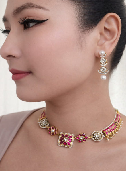 Close-up of a woman wearing a necklace and earrings 