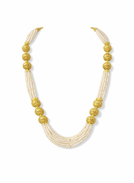 Necklace with white beads and gold accents 