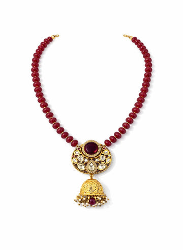 Red beaded necklace with a gold pendant