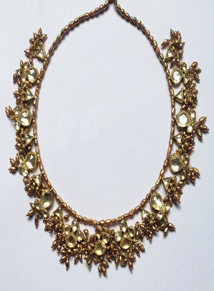 Gold tone Kundan necklace